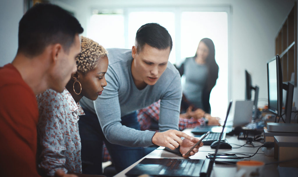 Mobile app developers coming up with a mobile app development strategy.